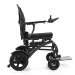 Carbon fibre wheelchair side profile with joystick controller and footplate