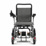 Explorer electric wheelchair seen from the front with the footplate down