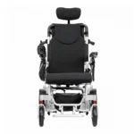 Reclining electric wheelchair front view with the footplate down